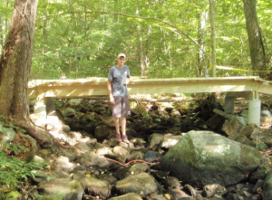 Shawn Clifton beside his bridge project.